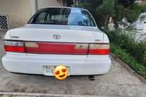 May be an image of car and text