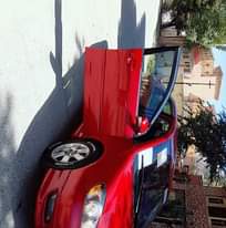 May be an image of car and text